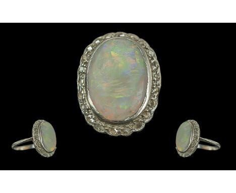 Edwardian Period 1902 - 1910 Ladies Platinum Opal and Diamond Set Dress Ring, Marked Platinum to Interior of Shank, The Centr