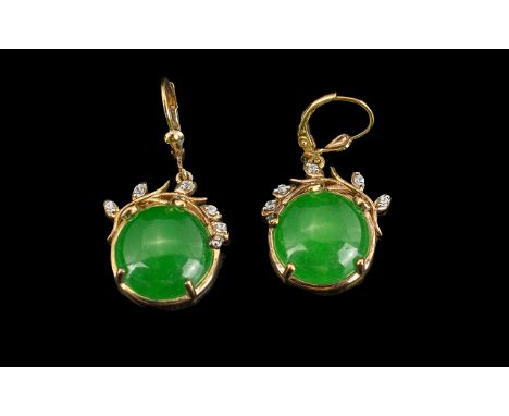 Pair of Green Jade Circular Drop Earrings, each of 13.25cts, with curving foliate surmounts, set with small white topaz, in 1