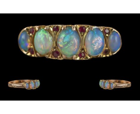 Antique Period Ladies 18ct Gold Opal and Ruby Set Ring with raised openwork setting, not marked, tests as high carat gold, th