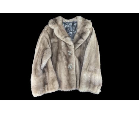 Ladies Light Brown Mink Jacket, half belt to back, hook and eye fastening, two slit pockets.  Fully lined in patterned sateen