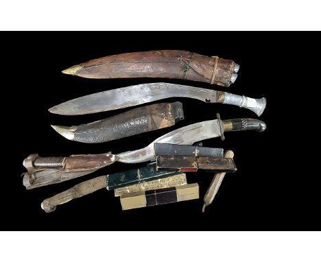 Collection of Vintage Knives and Cut Throat Razors, to include two Surati knives, two native knives, and six cut throat razor