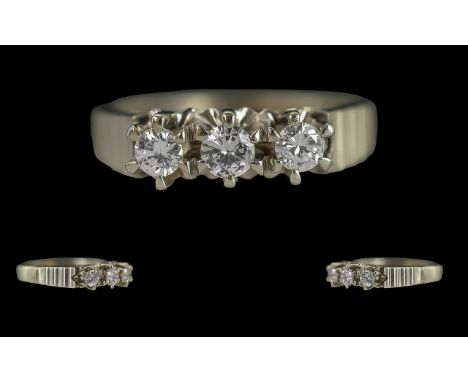Ladies 18ct White Gold 3 Stone Diamond Set Ring, Raised Open worked Setting, Full Hallmark to Interior of Shank. The 3 Well M