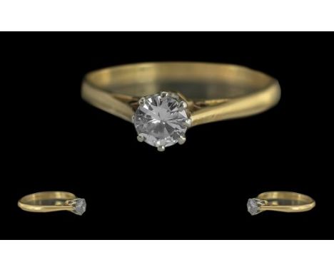 Ladies 18ct Gold Single Stone Diamond Set Ring. Marked 18ct to Interior of Shank. The Round Brilliant Cut Diamonds of Good Co