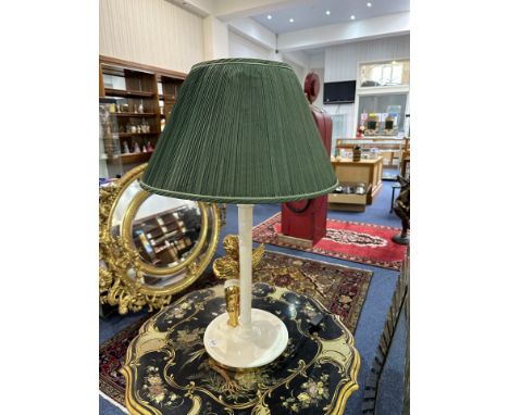 A Decorative Table Lamp, Featuring a Cherub Playing a Flute, on a Circular Marble Style Base, With a Green Shade. Overall Hei
