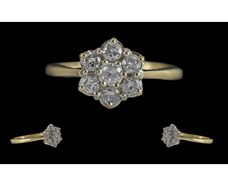Ladies Attractive 18ct Gold Diamond Set Cluster Ring, marked to interior of shank, the 7 faceted diamonds of good colour and 