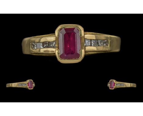 Ladies Attractive 18ct Gold Ruby and Diamond Set Dress Ring, full hallmark to interior of shank, the centre ruby of good colo