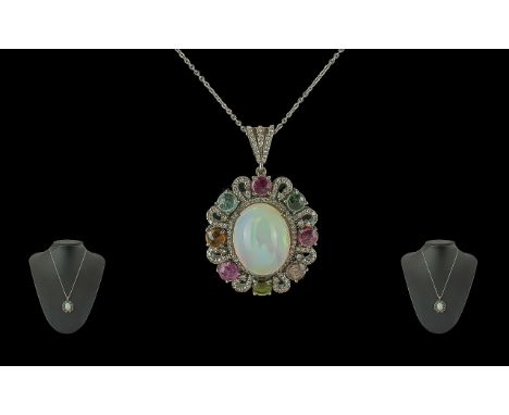 Silver Pendant Set with large cabochon opal, multicolour tourmalines and rose-cut diamonds on a silver chain, boxed. Opal 7.0