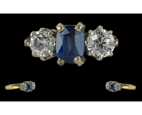 Ladies - Pleasing 18ct Gold 3 Stone Sapphire and Diamond Set Ring. Full Hallmark to Interior of Shank. The Central Blue Sapph