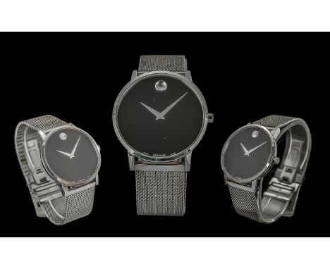 Gent's Movado Wristwatch with mesh style bracelet and black face with steel hands.  New battery fitted.  Working order.