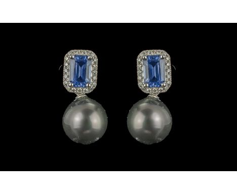 Pair Of Black Pearl, Step Cut Sapphire And Diamond Drop Earrings, boxed. Sapphires 1.41ct. Diamonds 0.15ct    ''