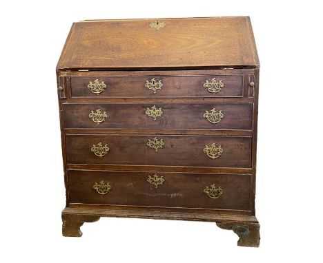Georgian mahogany bureau, the fall front enclosing fitted interior with central cupboard, pigeonholes and drawers, four long 