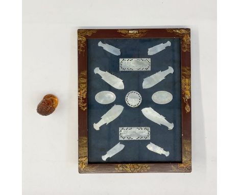 Japanese carved amber netsuke&nbsp;in the form of a fox, 2.5cm high and a small collection of Asian mother-of-pearl engraved 