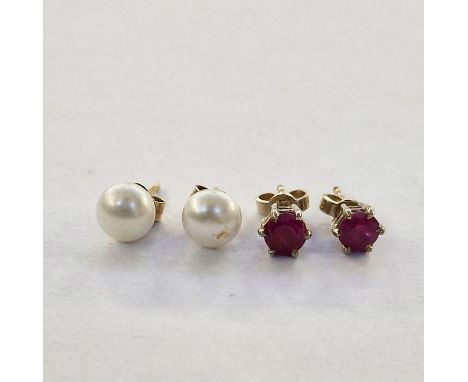 Pair cultured pearl and gold-coloured metal stud earrings&nbsp;and a pair of 18ct gold and ruby stud earrings, each set with 