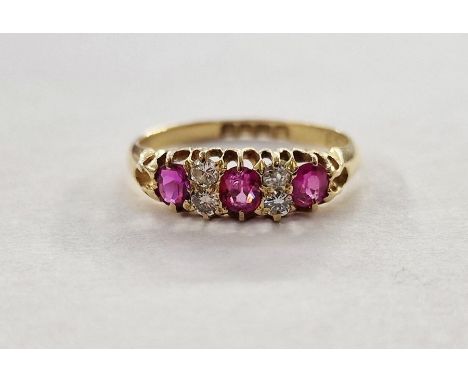 Edwardian 18ct gold, ruby and diamond ring set of three oval rubies interspersed by four old-cut diamonds, claw set, hallmark