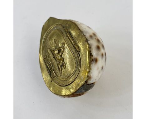 Snuff box&nbsp;created from a cowrie shell, with brass-coloured lid decorated with picture of a racehorse, 6.5cm long&nbsp;