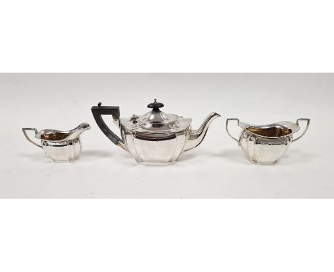 George V bachelor's tea service of three pieces in revived Georgian style, oblong and panelled, Birmingham 1911, 15ozt approx