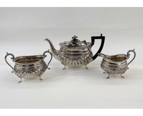 EPNS part tea service comprising teapot, sugar bowl and cream jug, on cabriole pad feet, gadrooned decoration (3)&nbsp;