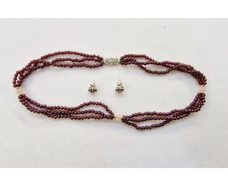 Beaded necklace with silver-coloured metal clasp set with diamonds, the largest diamond 2mm diameter approx. and a pair of si