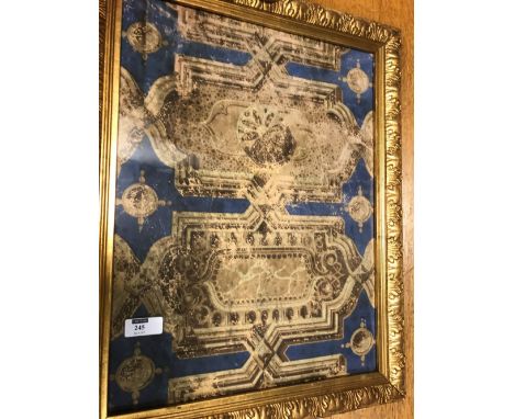 A fragment of hand painted early 19th century wallpaper decorated with a marbled architectural pattern, in an ornate gilt fra