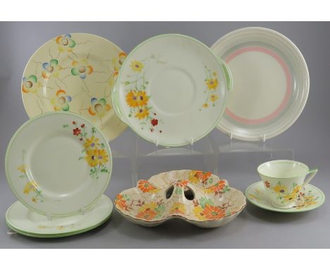 A group of early twentieth century art deco period floral wares, c. 1910-30. Comprising of: two Myott plates, a large floral 