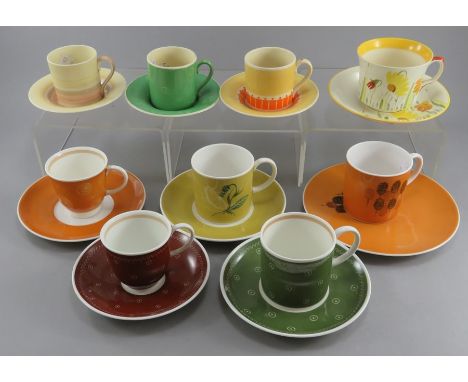 A group of early twentieth century art deco Susie Cooper cups and saucers, c. 1910-30. To include various styles, colour ways