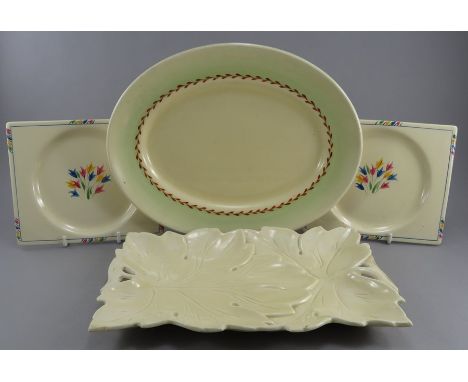 Two early twentieth century art deco period Clarice Cliff, Wilkinson and Newport Pottery serving dishes, c. 1910-30. Comprisi