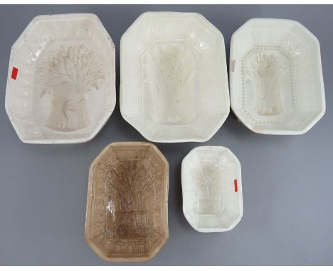 A group of early nineteenth century creamware and earthenware jelly moulds, c.1820-50. To include two Spode examples, two Cop