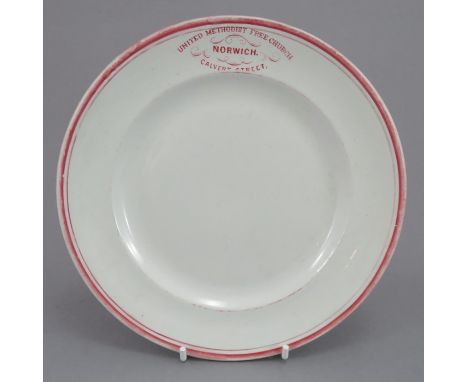 A mid-nineteenth century red transfer-printed special-order plate, c.1840-50. The rim is banded and the top of the plate has 