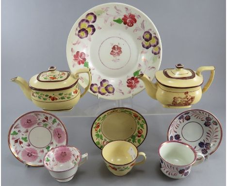 A group of early nineteenth century miniature tea wares, c. 1825. To include a yellow ware teapot printed with an Adam Buck p