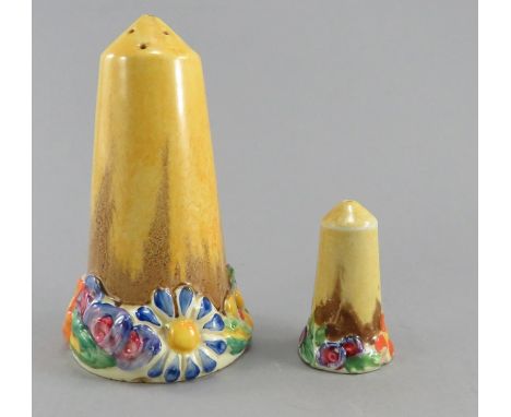 An early twentieth century art deco period Clarice Cliff, Wilkinson salt and pepper pot, c. 1910-30. Both are of moulded form
