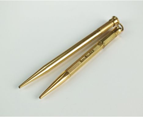 A Sampson Mordan & Co 9ct gold engine turned pen, weight 13.4g together with a gold plated pen (2)