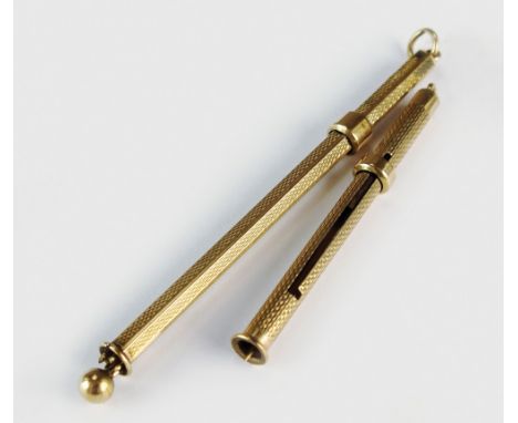 A 9ct gold swizel stick, together with a 9ct gold toothpick, total weight 7.8g (2)