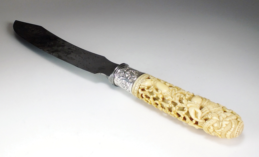 A Hunt & Roskell ivory handled knife, the carved handle depicting