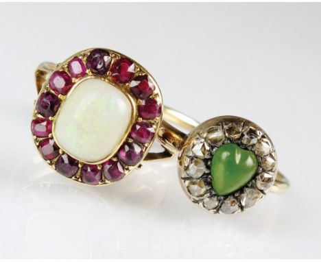 An opal and garnet cluster ring, together with a rose cut diamond and green stone set cluster ring, total weight 7.8g (2)