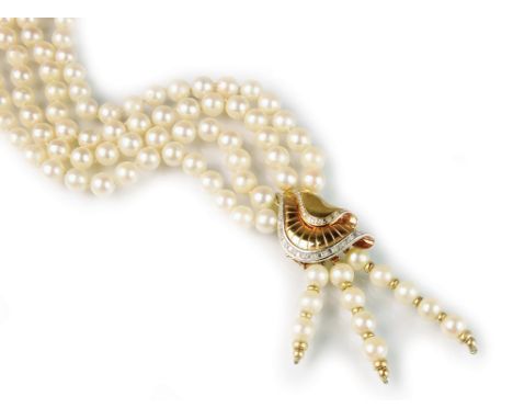 A two strand uniform cultured pearl necklace, with diamond set stylised fan pendant suspending three cultured pearl tassels, 