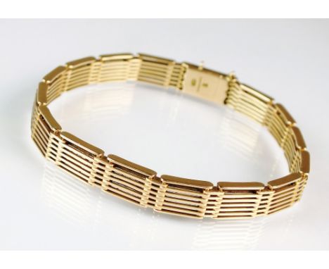 A rose metal seven bar gate link bracelet, with box link clasp stamped '15ct', weight 21.3 (at fault)