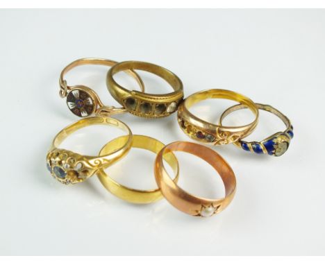 A 22ct gold wedding band, weight 2.3g, together with an 18ct gold sapphire and diamond cluster ring, weight 4.3g, a yellow me