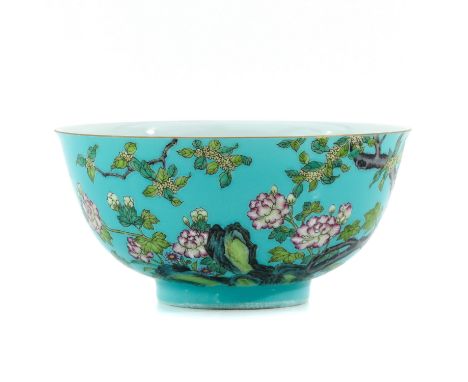 Light green ground with Famille Rose enamels decorated with flowers, Yongzheng mark, 16 cm. in diameter. 