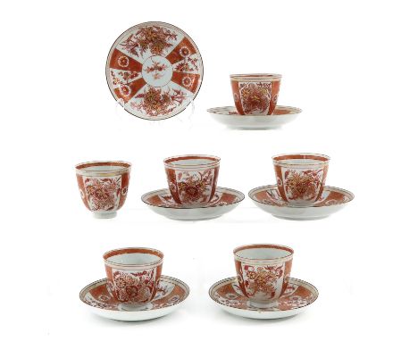 Iron red and gilt floral decor, cups measure 7 cm. in diameter, saucers measure 13 cm. in diameter, Kangxi Period, in diverse