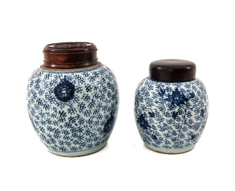 Marked with double ring, ginger jars measure 21 cm. and 26 cm. tall. 