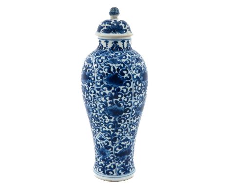 Decorated with flowers, Kangxi Period, 28 cm. tall, top is restored.