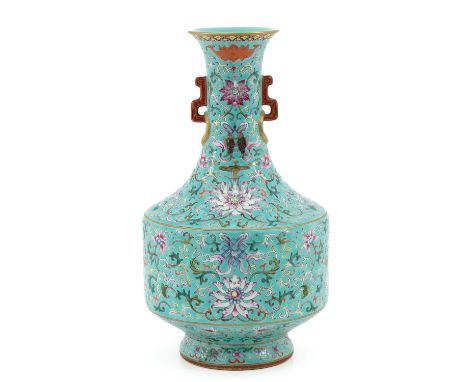 Light green ground decorated with flowers and Buddhist symbols, Jiaqing mark, 31 cm. tall. 