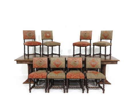 Including table 300 x 1000 cm, 12 chairs with twisted feet and tapestry coverings.  Provenance:  This table has stood in the 