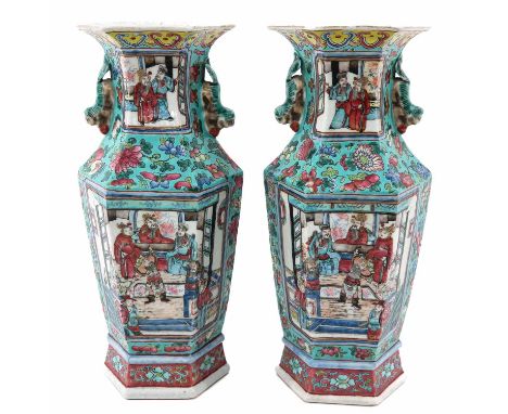 Light green ground decorated with flowers and depicting scenes with gathering of Chinese figures, temple lion handles, 33 cm.