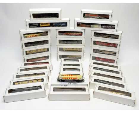 A selection of Hornby 00-gauge rolling stock, including: BP; Sodor Mail; Weetabix; and others.
