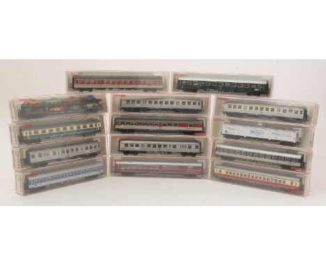 Fleischmann rolling stock, mostly carriages, various designs and liveries, all boxed. (14)