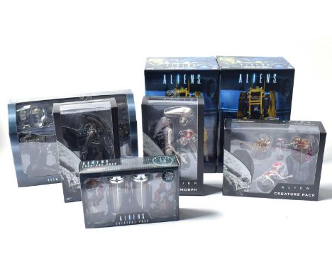 A collection of Neca and Reel Toys Alien figures, all boxed, including: Neomorph; Xenomorph; USCM Arsenal accessory set; two 