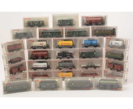 Fleischmann rolling stock, including flat bogies, wagons, carriages, takes and others, all boxed. (32)