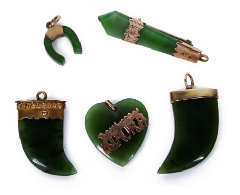 Five 19th Century Maori Nephrite Jade Brooches/Pendants:
Comprising two gold set claw pendants, a gold set brooch/pendant, a 