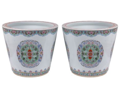 A Pair of Large 19th Century Chinese Famille Rose Jardinieres:
The bodies surmounted with enamelled floral cartouches, the li